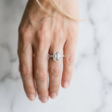 White gold Emerald Cut Diamond Solitaire with Side Baguettes and Channel Set Band_136