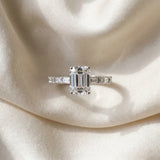 White gold Emerald Cut Diamond Solitaire with Side Baguettes and Channel Set Band_143