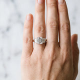 White gold Emerald Cut Diamond Three-Stone Ring with Four-Prong Setting and Classic Band_92