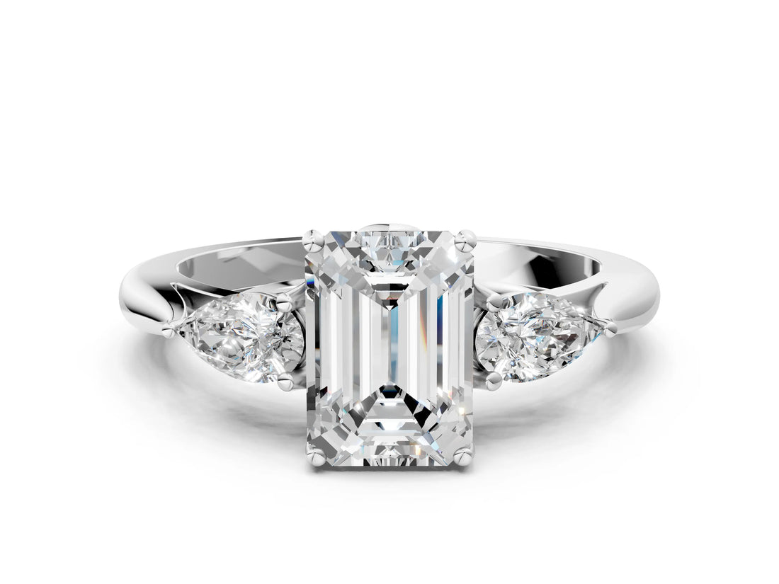 White gold Emerald Cut Diamond Three-Stone Ring with Pear Side Stones and Four-Prong Setting_73