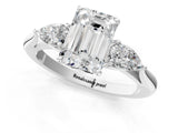 White gold Emerald Cut Diamond Three-Stone Ring with Pear Side Stones and Four-Prong Setting_77