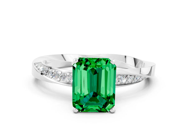 White gold Emerald Cut Emerald Engagement Ring with Side Stone Accents and Four-Prong Setting