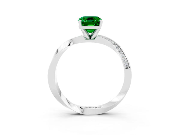 White gold Emerald Cut Emerald Engagement Ring with Side Stone Accents and Four-Prong Setting