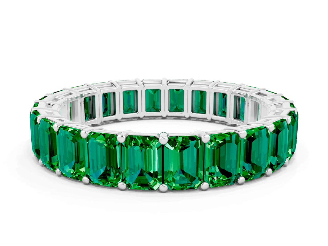 Platinum Emerald Cut Emerald Eternity Band with Shared Prong Setting