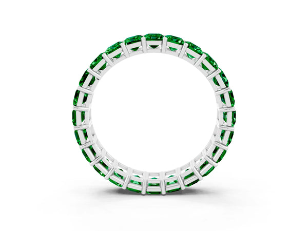 Platinum Emerald Cut Emerald Eternity Band with Shared Prong Setting