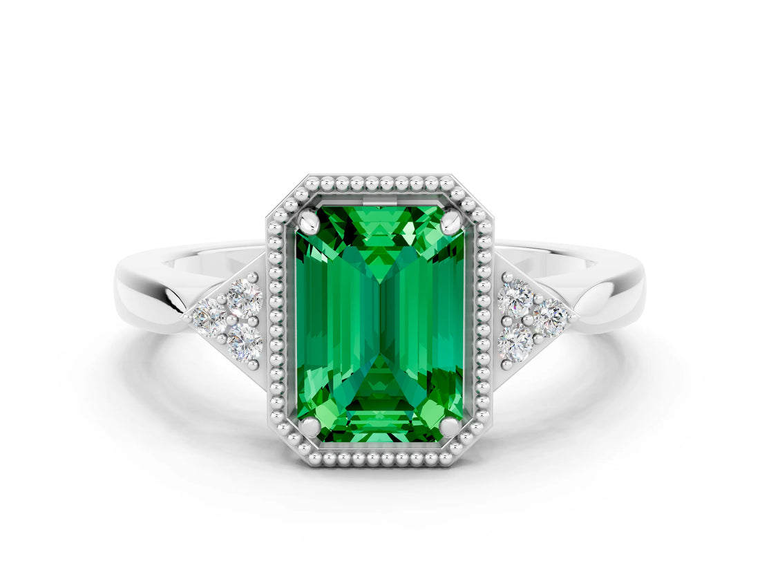 White gold Emerald Cut Emerald Halo Ring with Tapered Band and Four-Prong Setting