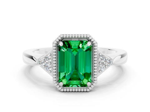 White gold Emerald Cut Emerald Halo Ring with Tapered Band and Four-Prong Setting