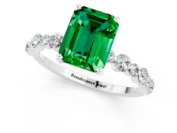Platinum Emerald Cut Emerald Prong Set Engagement Ring with Pavé Band