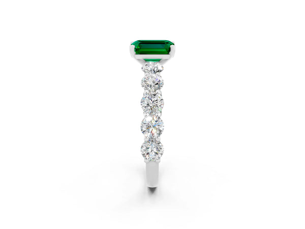 Platinum Emerald Cut Emerald Prong Setting with Side Stones on a Pave Band