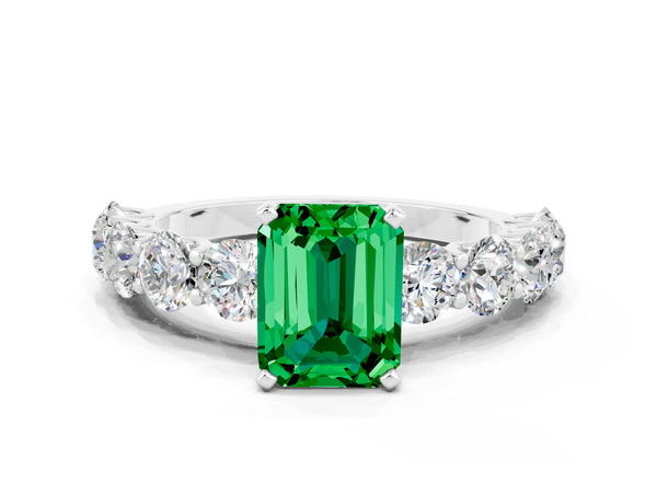 White gold Emerald Cut Emerald Prong Setting with Side Stones on a Pave Band