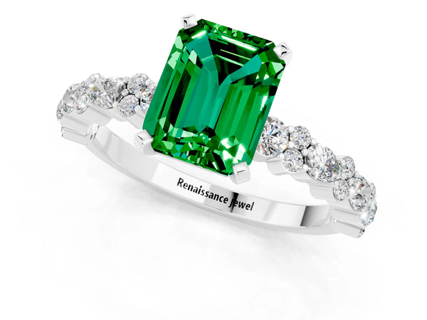 Platinum Emerald Cut Emerald Side Stone Solitaire Ring with Round  and Four-Prong Setting