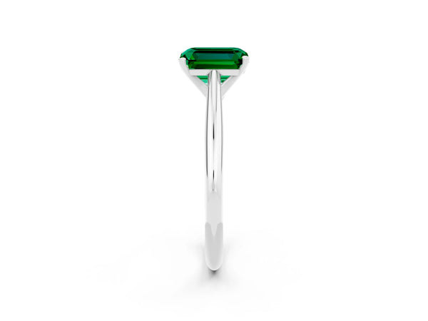 White gold Emerald Cut Emerald Solitaire Engagement Ring with Cathedral Setting and Four-Prong Mount