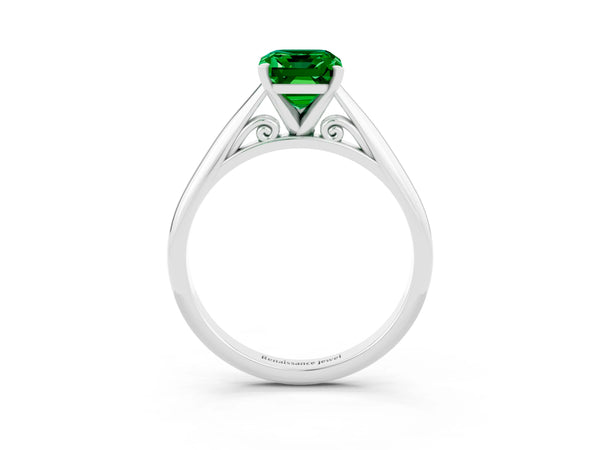 White gold Emerald Cut Emerald Solitaire Engagement Ring with Cathedral Setting and Four-Prong Mount