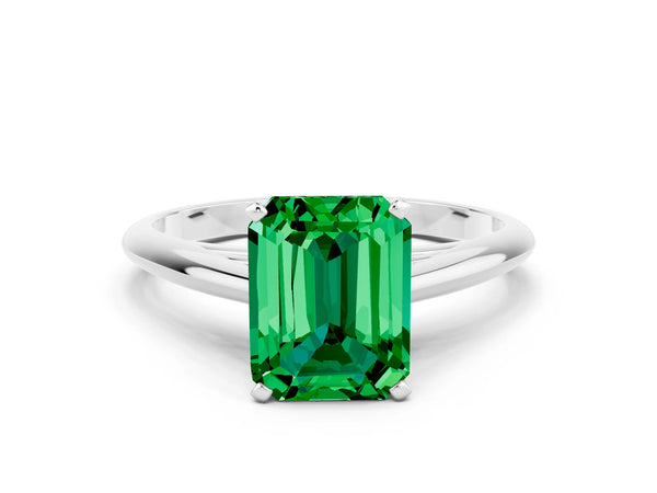 White gold Emerald Cut Emerald Solitaire Engagement Ring with Cathedral Setting and Four-Prong Mount