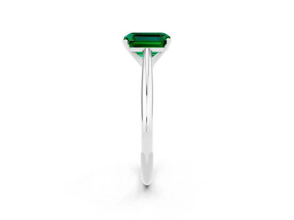 White gold Emerald Cut Emerald Solitaire Engagement Ring with Cathedral Setting and Four-Prong Mount