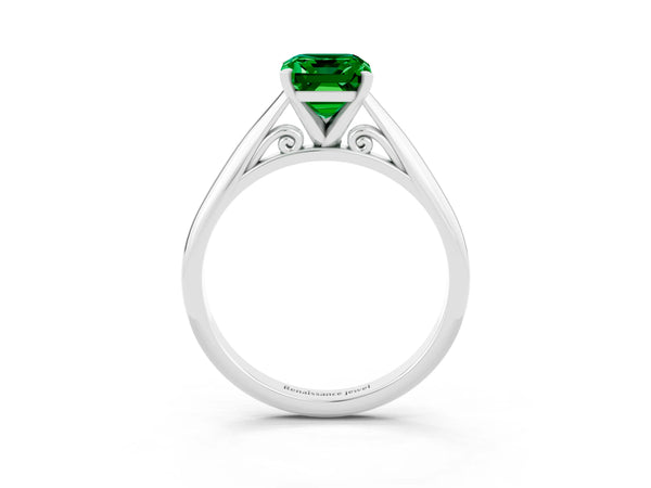 White gold Emerald Cut Emerald Solitaire Engagement Ring with Cathedral Setting and Four-Prong Mount