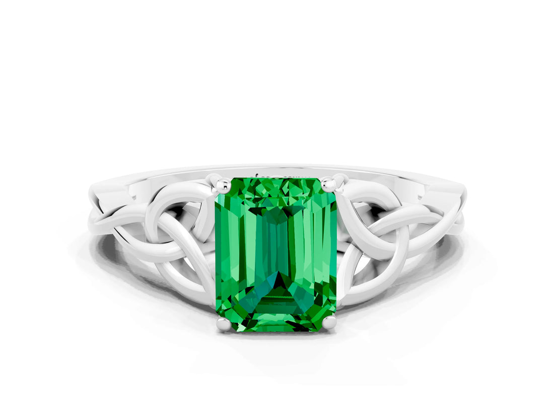 White gold Emerald Cut Emerald Solitaire Engagement Ring with Celtic Knot Band and Four-Prong Setting