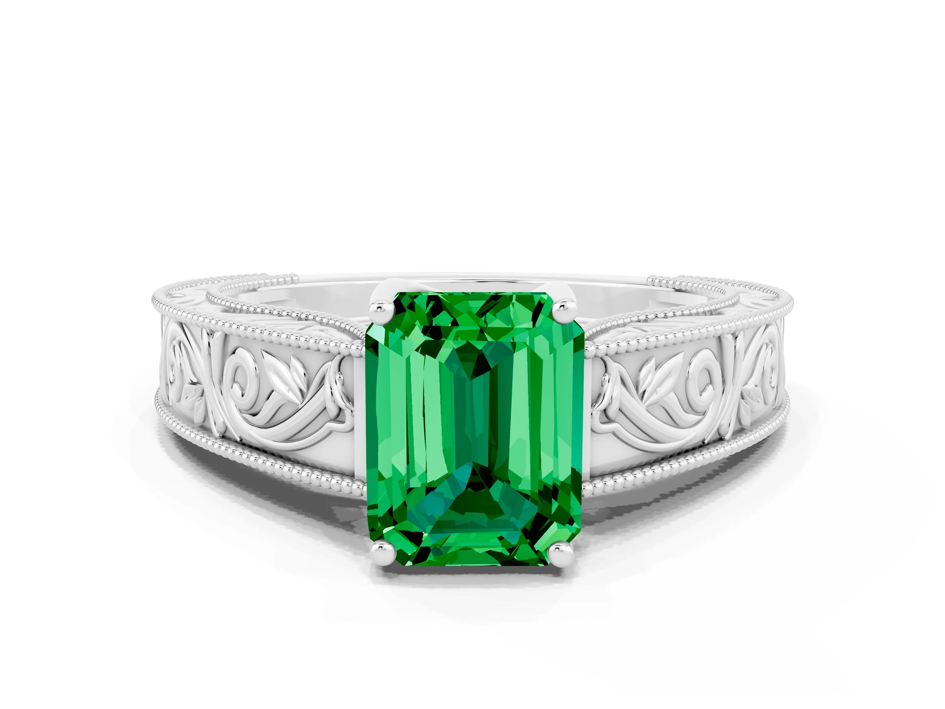 White gold Emerald Cut Emerald Solitaire Ring with Engraved Band and Four-Prong Setting