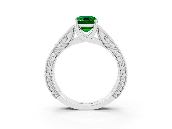 White gold Emerald Cut Emerald Solitaire Ring with Engraved Band and Four-Prong Setting