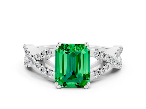 White gold Emerald Cut Emerald Solitaire Ring with Four-Prong Setting and Twisted Pavé Band