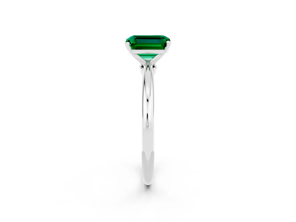 Silver Emerald Cut Emerald Solitaire Ring with Six-Prong Setting and Classic Band