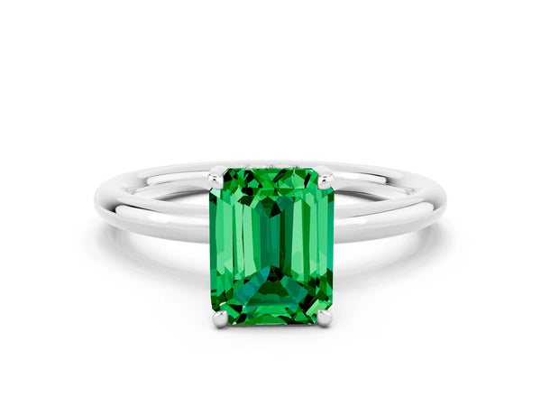 Silver Emerald Cut Emerald Solitaire Ring with Thin Band and Four-Prong Setting