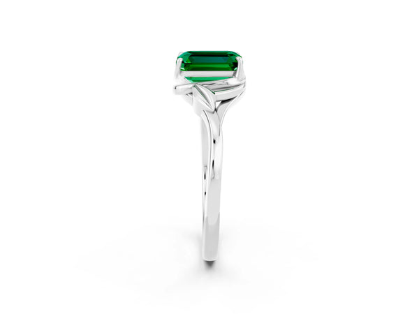 Silver Emerald Cut Emerald Solitaire Ring with Twist Band and Four-Prong Setting