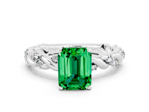 White gold Emerald Cut Emerald Solitaire Ring with Twisted Band and Pavé Accents
