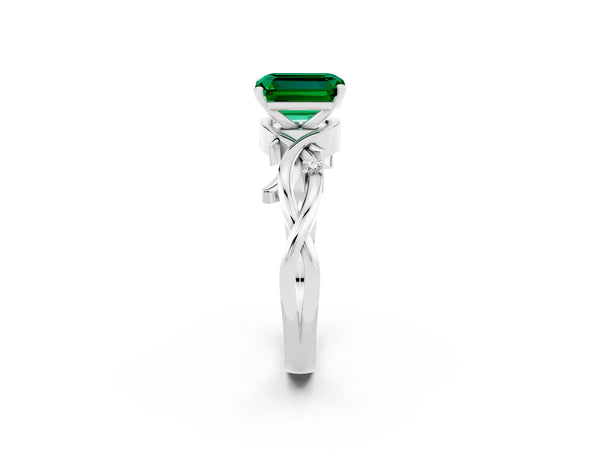 Platinum Emerald Cut Emerald Solitaire Ring with Twisted Band and Prong Setting
