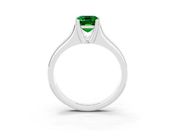Platinum Emerald Cut Emerald Solitaire Ring with Wide Band and Prong Setting