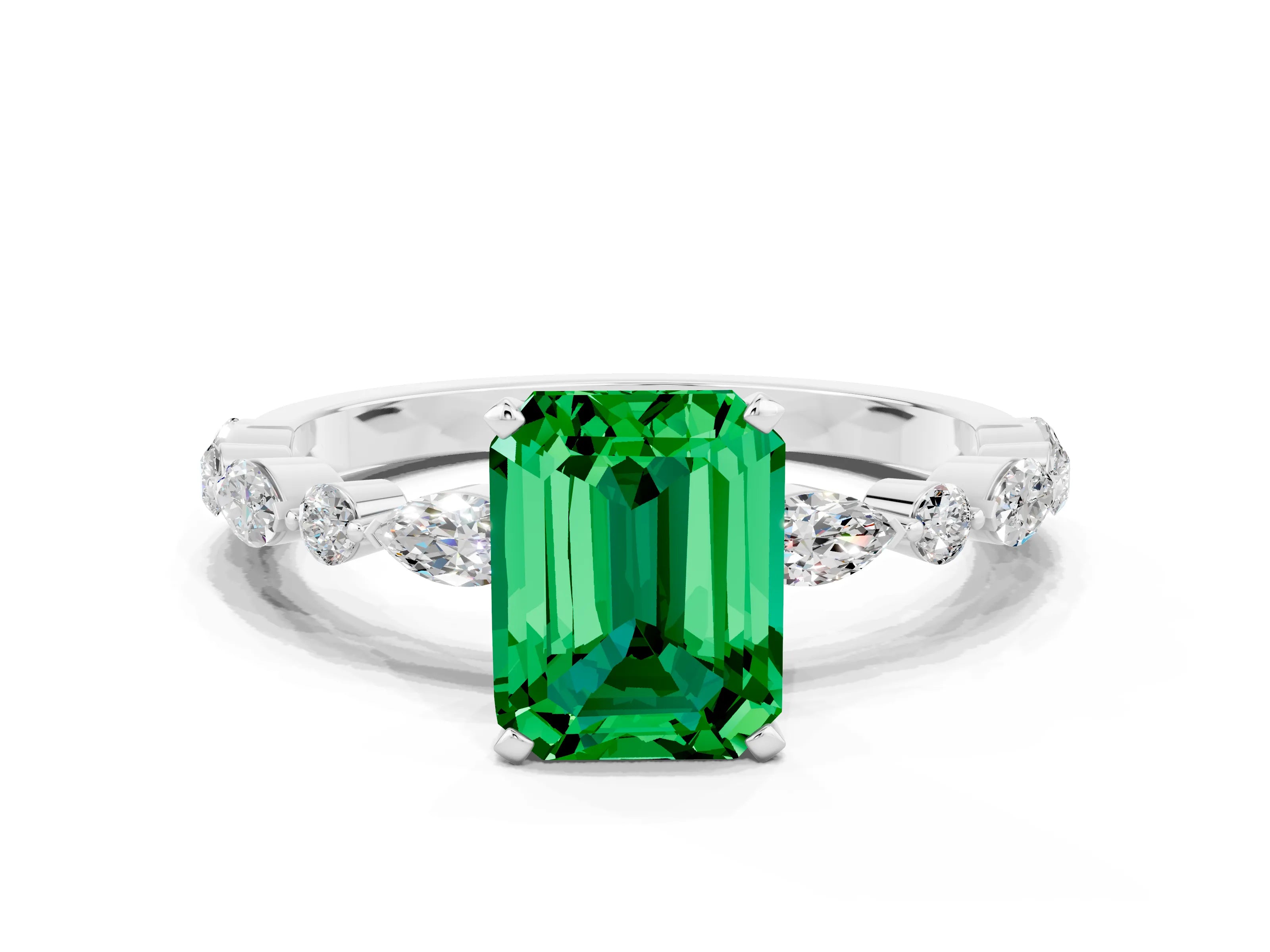White gold Emerald Cut Emerald Solitaire with Side Stones on a Pavé Band and Four-Prong Setting