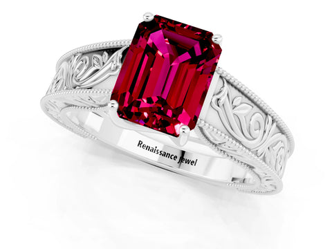 White gold Emerald Cut Garnet Solitaire Ring with Engraved Band and Four-Prong Setting_1