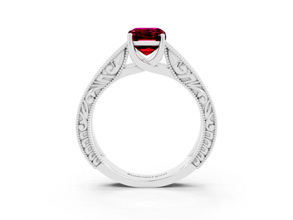 White gold Emerald Cut Garnet Solitaire Ring with Engraved Band and Four-Prong Setting