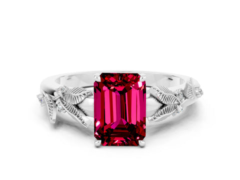 White gold Emerald Cut Garnet Solitaire Ring with Leaf Motif Band and Four-Prong Setting