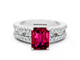 White gold Emerald Cut Garnet Solitaire Ring with Pavé and Channel Set Band