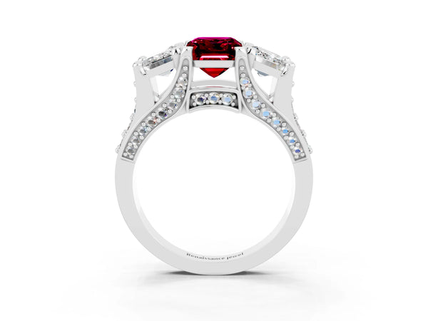 Platinum Emerald Cut Garnet Three-Stone Ring with Channel Set Band and Four-Prong Setting
