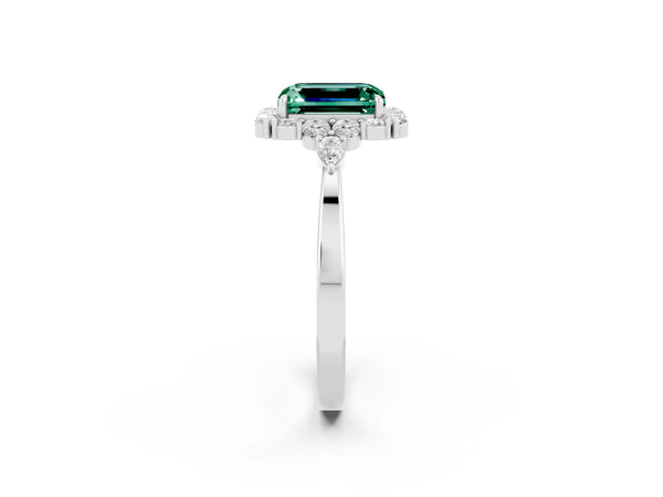 Platinum Emerald Cut Green Sapphire Halo Ring with Pear Side Stones and Prong Setting