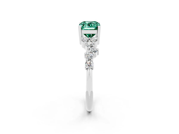 Platinum Emerald Cut Green Sapphire Scattered Round Accent Ring with Prong Setting