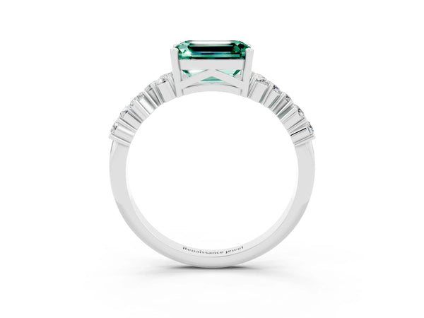 Platinum Emerald Cut Green Sapphire Scattered Round Accent Ring with Prong Setting