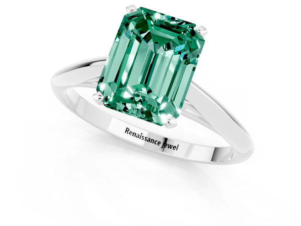 Platinum Emerald Cut Green Sapphire Solitaire Engagement Ring with Cathedral Setting and Four-Prong Mount