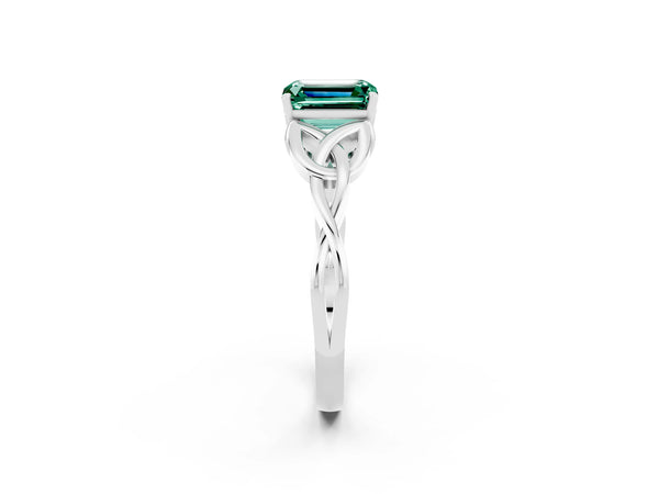 White gold Emerald Cut Green Sapphire Solitaire Engagement Ring with Celtic Knot Band and Four-Prong Setting
