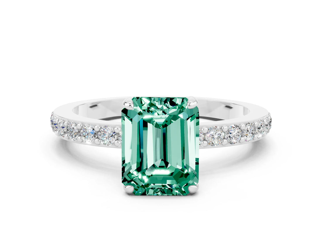 White gold Emerald Cut Green Sapphire Solitaire Engagement Ring with Pavé Band and Four-Prong Setting