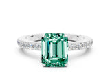 White gold Emerald Cut Green Sapphire Solitaire Engagement Ring with Pavé Band and Four-Prong Setting