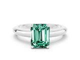 White gold Emerald Cut Green Sapphire Solitaire Engagement Ring with Round Band and Four-Prong Setting