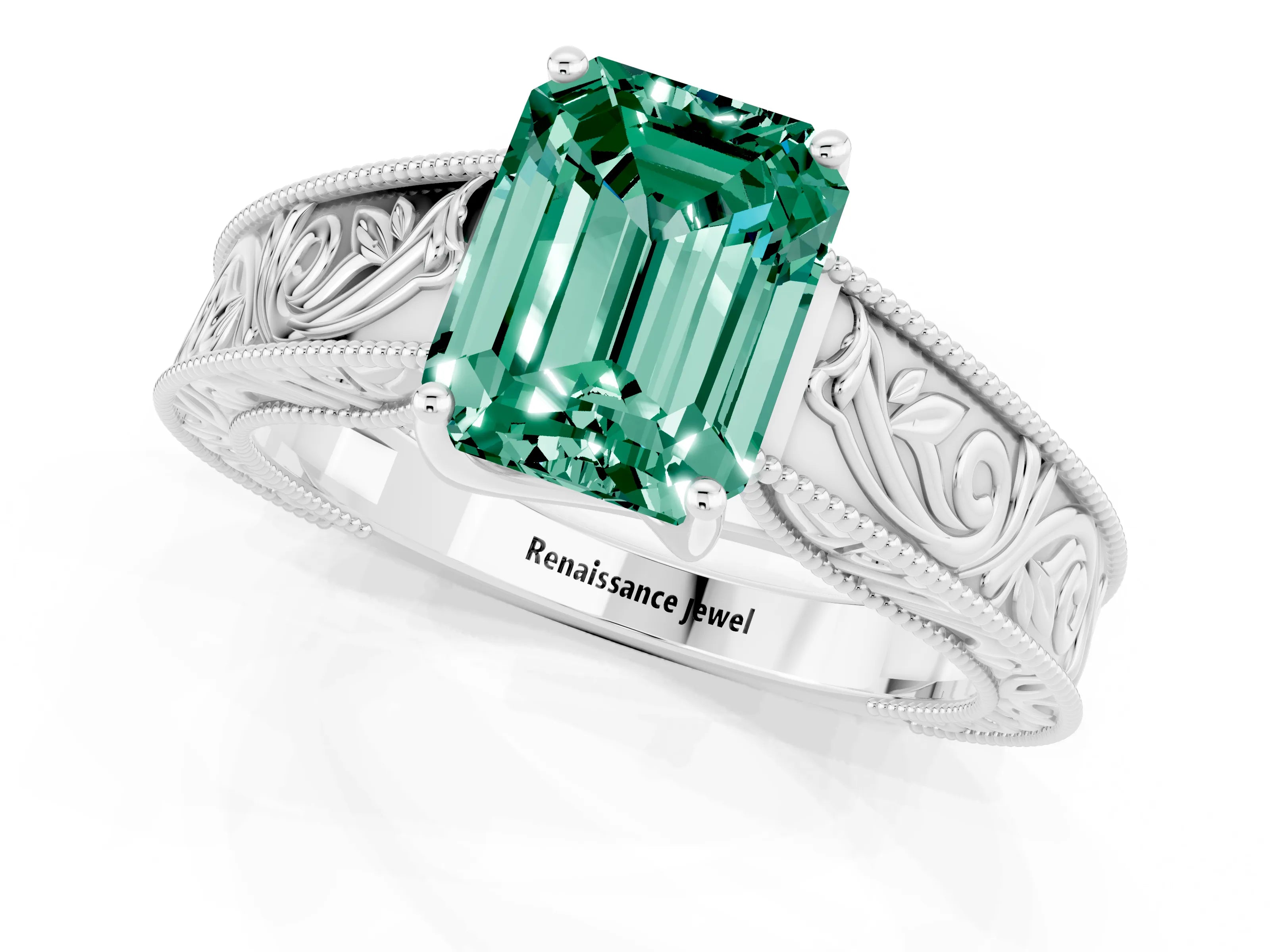 White gold Emerald Cut Green Sapphire Solitaire Ring with Engraved Band and Four-Prong Setting_1