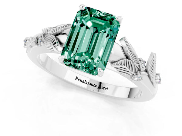 White gold Emerald Cut Green Sapphire Solitaire Ring with Leaf Motif Band and Four-Prong Setting