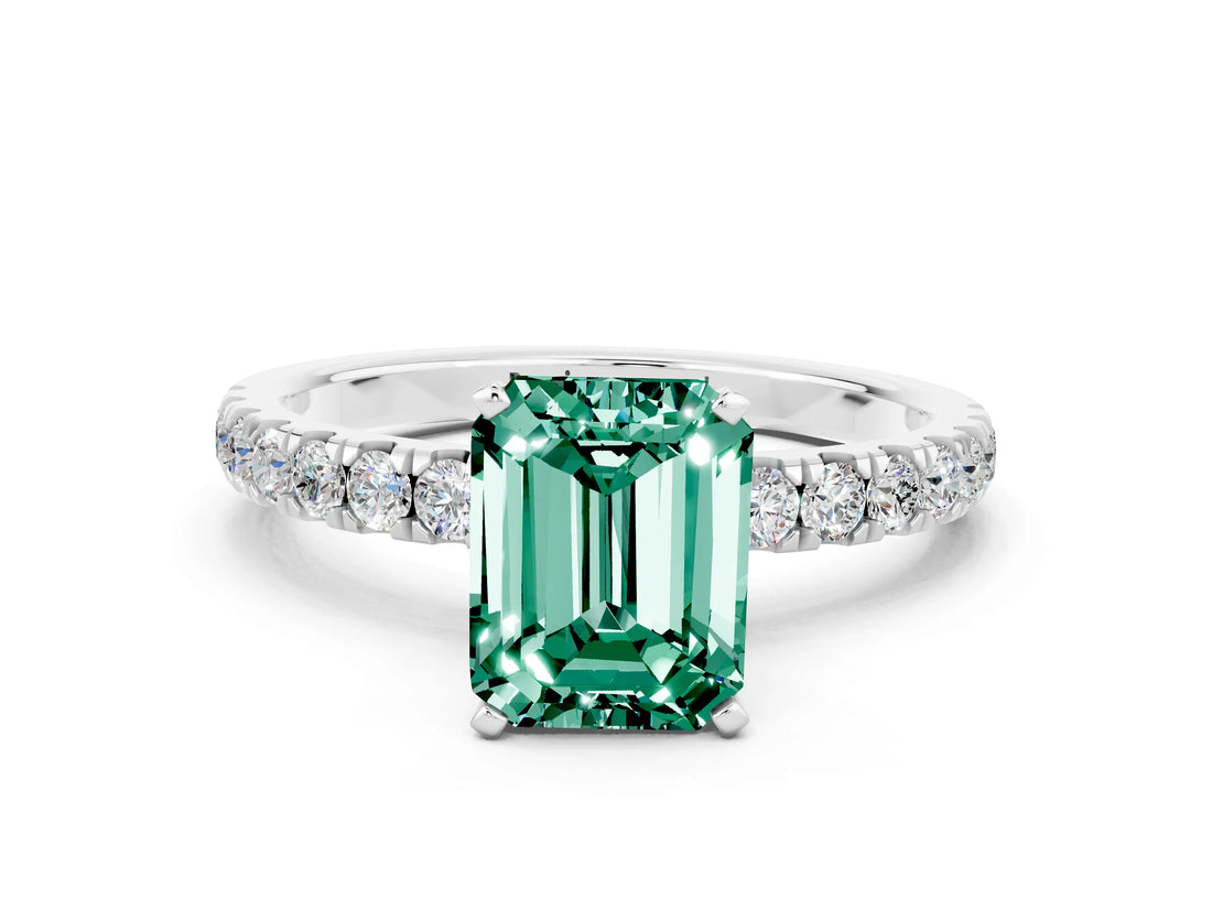 White gold Emerald Cut Green Sapphire Solitaire Ring with Pavé Accents and Four-Prong Setting