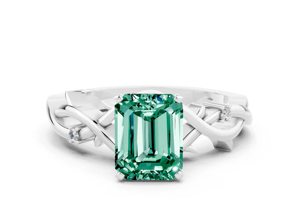 Silver Emerald Cut Green Sapphire Solitaire Ring with Twisted Band and Prong Setting