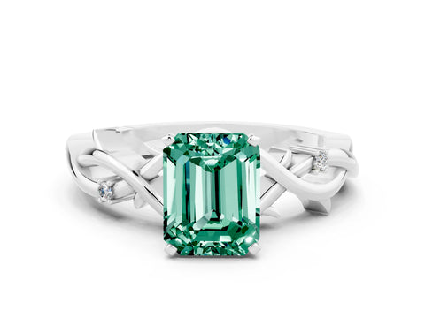 White gold Emerald Cut Green Sapphire Solitaire Ring with Twisted Band and Prong Setting