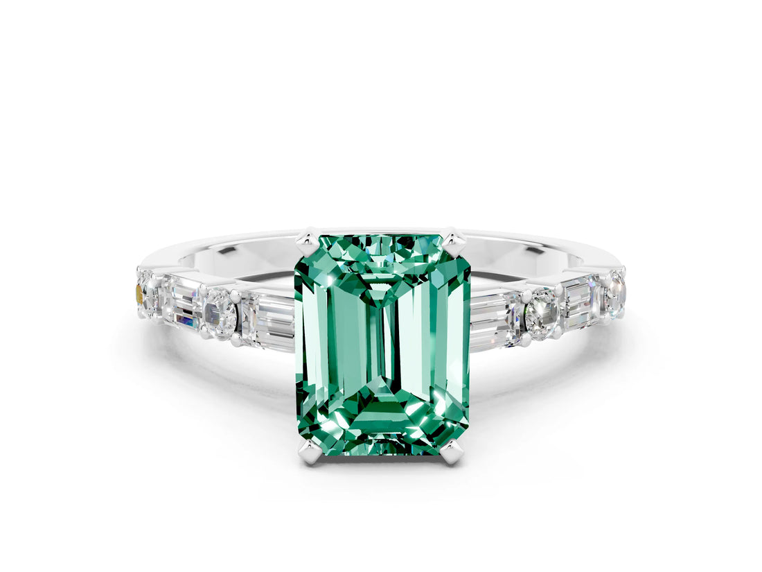White gold Emerald Cut Green Sapphire Solitaire with Side Baguettes and Channel Set Band